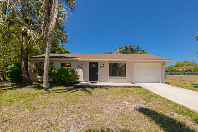 207 SW Bridgeport Drive Port Saint Lucie, FL House Active - Photo 1 of 44. Opens carousel modal