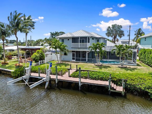 1599 SW Dyer Point Road Palm City, FL House Sold - Photo 1 of 45. Opens carousel modal