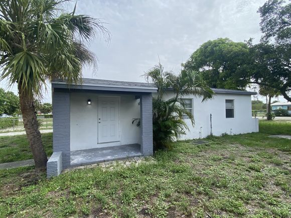 1136 Avenue G Riviera Beach, FL House Active - Photo 1 of 7. Opens carousel modal