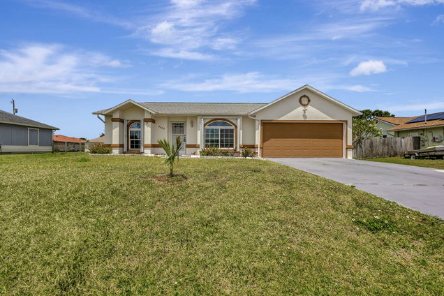 5489 NW Evanston Avenue Port Saint Lucie, FL House Active - Photo 1 of 45. Opens carousel modal