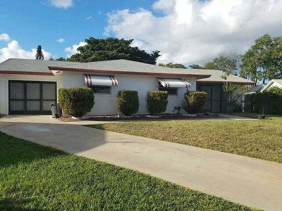 10133 Windtree Lane N Boca Raton, FL House Active - Photo 1 of 13. Opens carousel modal