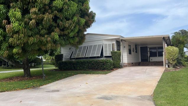 7761 SE Shenandoah Drive Hobe Sound, FL House Active - Photo 1 of 26. Opens carousel modal