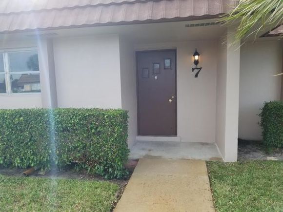 5725 Fernley Drive E Unit 7 West Palm Beach, FL Condo Active - Photo 1 of 7. Opens carousel modal