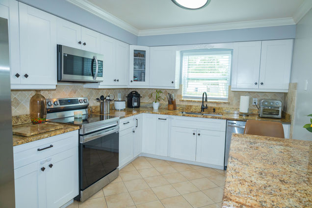 411 Forest Estate Drive West Palm Beach, FL House Active - Photo 1 of 26. Opens carousel modal