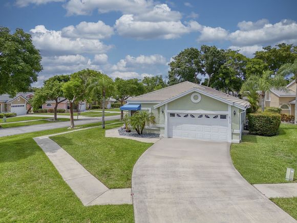 8095 Burlington Court Lake Worth, FL House Active - Photo 1 of 16. Opens carousel modal