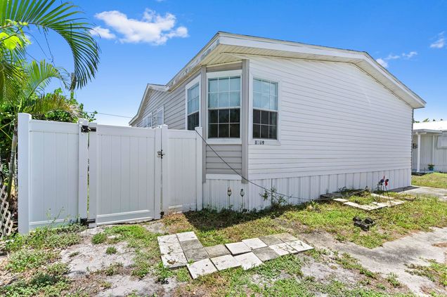 8169 SE Eagle Avenue Hobe Sound, FL House Active - Photo 1 of 24. Opens carousel modal