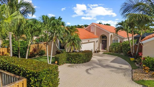 2657 La Lique Circle Palm Beach Gardens, FL House Active - Photo 1 of 21. Opens carousel modal