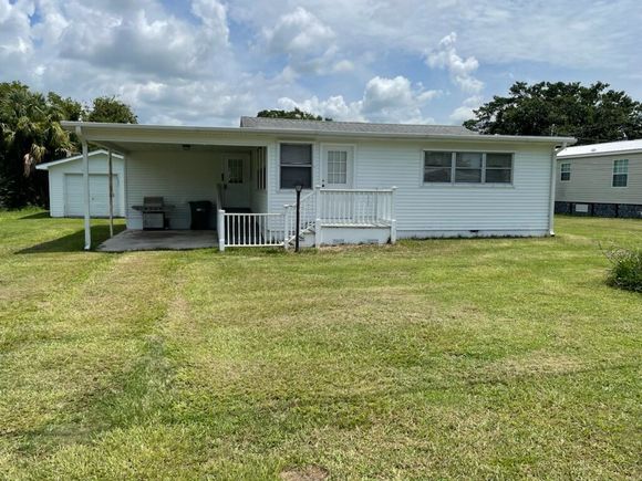 3105 SE 34th Court Court Okeechobee, FL House Active - Photo 1 of 20. Opens carousel modal