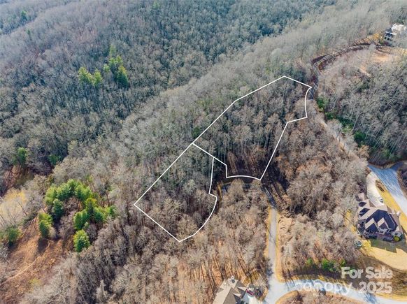 19 & 20 Marcus Ridge Drive Unit 26/34 Fairview, NC Plot of land Active - Photo 1 of 15. Opens carousel modal