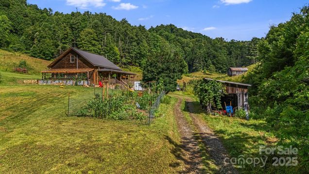 799 Fire Scald Road Green Mountain, NC House Active - Photo 1 of 48. Opens carousel modal