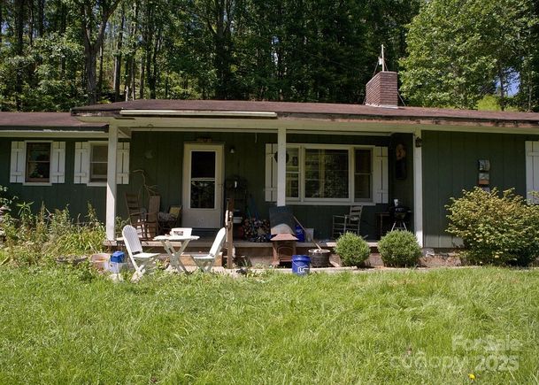 153 Moonshine Mountain Road Burnsville, NC House Active - Photo 1 of 32. Opens carousel modal