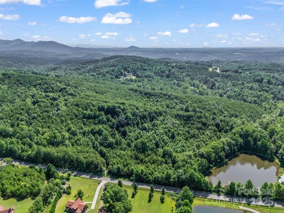 0000 Bills Creek Road Lake Lure, NC Plot of land Active - Photo 1 of 29. Opens carousel modal