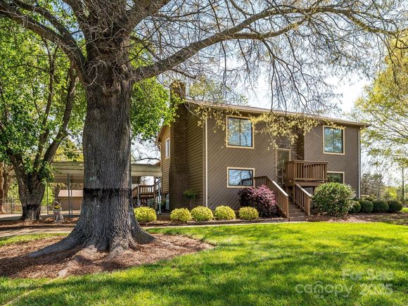 13815 Mayes Road Huntersville, NC House Active - Photo 1 of 28. Opens carousel modal