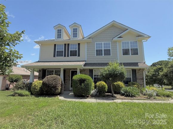 7534 April Mist Trail Huntersville, NC House Active - Photo 1 of 47. Opens carousel modal