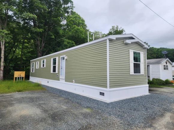 9 Walnut Hartford, VT House Active - Photo 1 of 7. Opens carousel modal