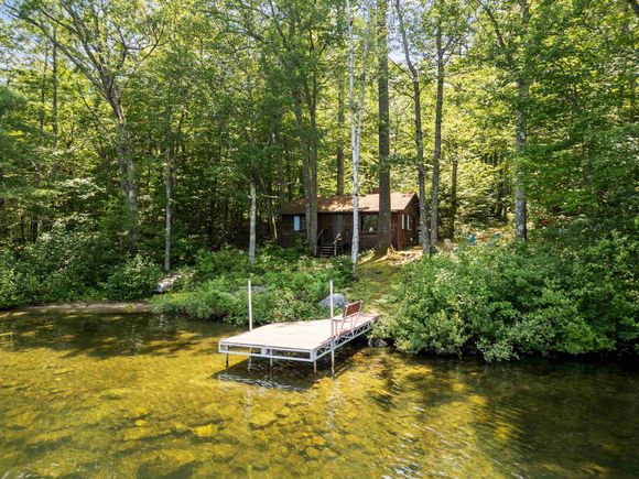 157 Kanasatka Moultonborough, NH House Active - Photo 1 of 38. Opens carousel modal