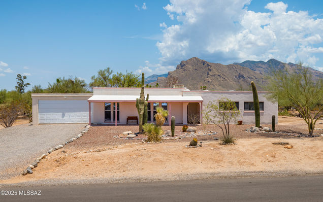7722 N Ave De Carlotta Tucson, AZ House Active - Photo 1 of 28. Opens carousel modal