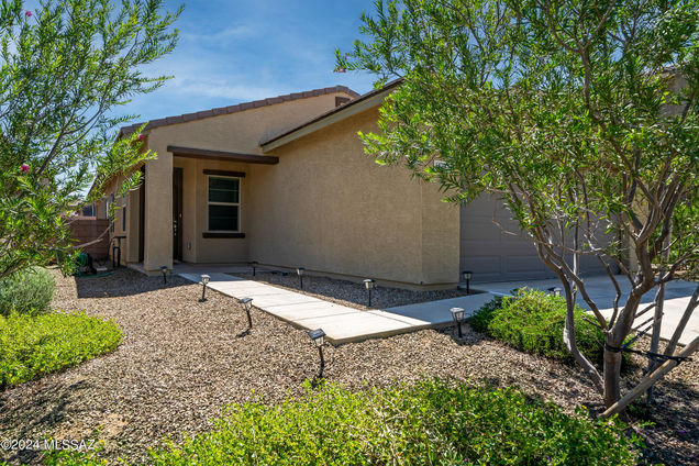 6997 W Hedge Rose Drive Tucson, AZ House Active - Photo 1 of 25. Opens carousel modal
