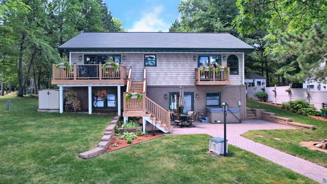 67490 W Crystal Lake Rd Iron River, WI House Active - Photo 1 of 50. Opens carousel modal