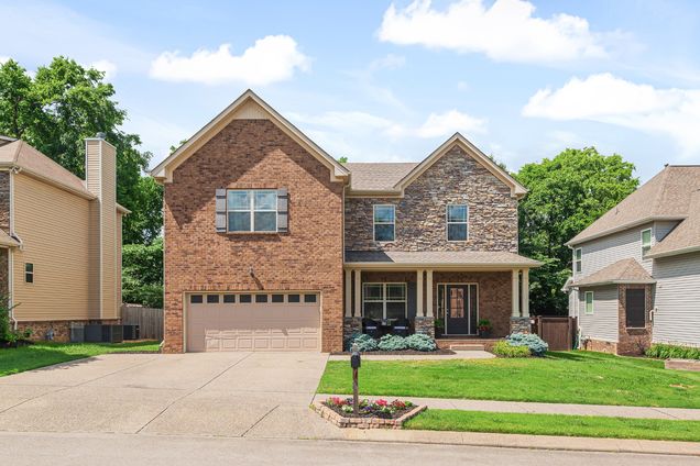 1043 Achiever Cir Spring Hill, TN House Sold - Photo 1 of 38. Opens carousel modal