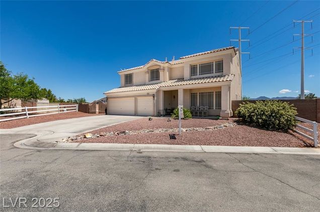 10290 Marion Morrison Court Las Vegas, NV House Active - Photo 1 of 77. Opens carousel modal