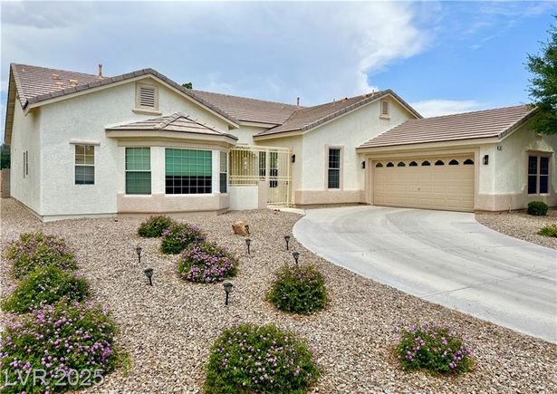 5422 Nestled Moon Court Las Vegas, NV House Active - Photo 1 of 52. Opens carousel modal