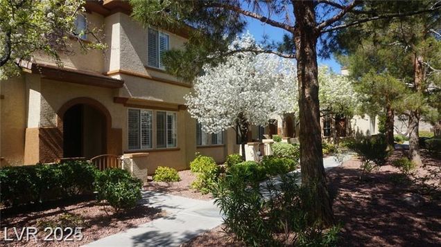10180 Deerfield Beach Avenue Unit 101 Las Vegas, NV House Active - Photo 1 of 57. Opens carousel modal