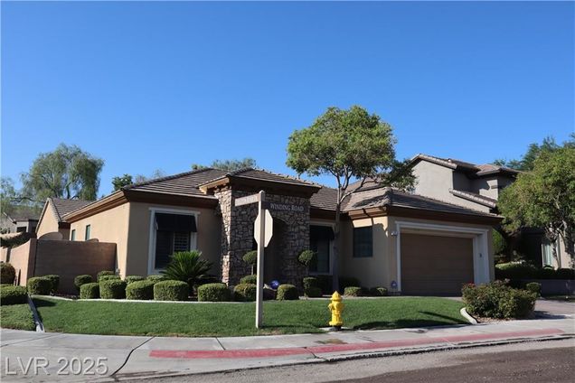 19 Winding Road Henderson, NV House Active - Photo 1 of 37. Opens carousel modal