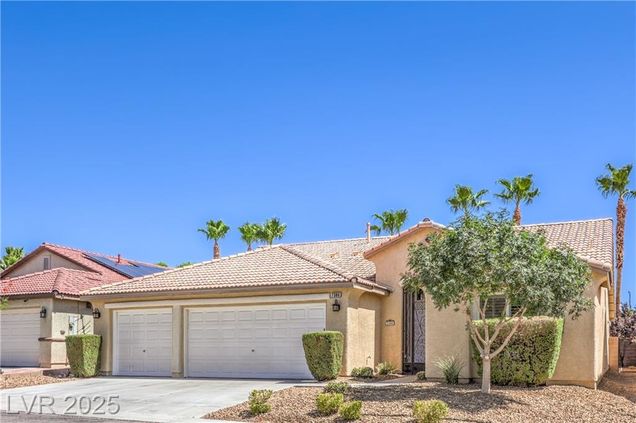 7386 Comanche Canyon Avenue Las Vegas, NV House Active - Photo 1 of 36. Opens carousel modal