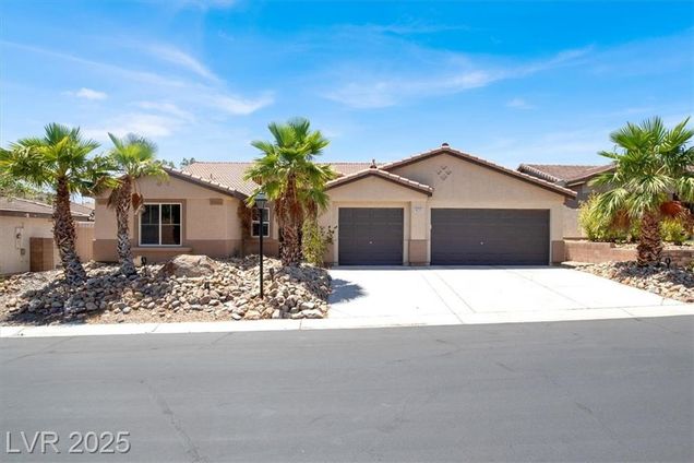 8225 Cabin Springs Avenue Las Vegas, NV House Active - Photo 1 of 22. Opens carousel modal