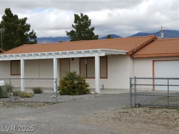 5451 Genoa Avenue Pahrump, NV House Active - Photo 1 of 17. Opens carousel modal