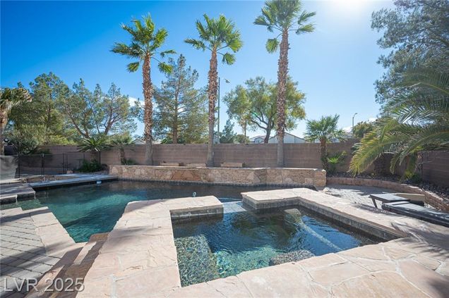 7875 Villa Pintura Avenue Las Vegas, NV House Active - Photo 1 of 58. Opens carousel modal