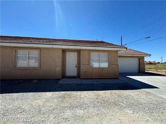 1360 Bourbon Street Unit B Pahrump, NV House Active - Photo 1 of 13. Opens carousel modal