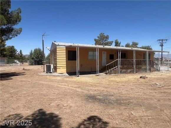 3020 West Charleston Park Avenue Pahrump, NV House Active - Photo 1 of 25. Opens carousel modal