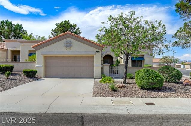 10616 Sky Meadows Avenue Las Vegas, NV Townhouse Active - Photo 1 of 64. Opens carousel modal
