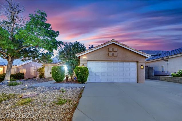 7921 Thorne Pine Avenue Las Vegas, NV House Active - Photo 1 of 52. Opens carousel modal