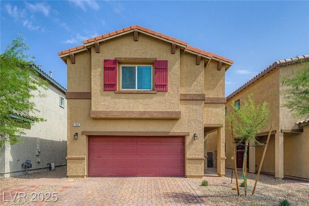 7866 Pink Opal Avenue Las Vegas, NV House Active - Photo 1 of 32. Opens carousel modal