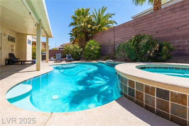6251 Tuckaway Cove Avenue Las Vegas, NV House Active - Photo 1 of 33. Opens carousel modal
