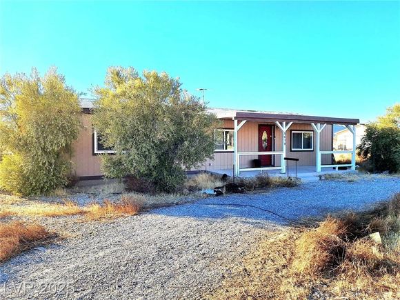 5610 North Tecopa Street Pahrump, NV House Active - Photo 1 of 33. Opens carousel modal