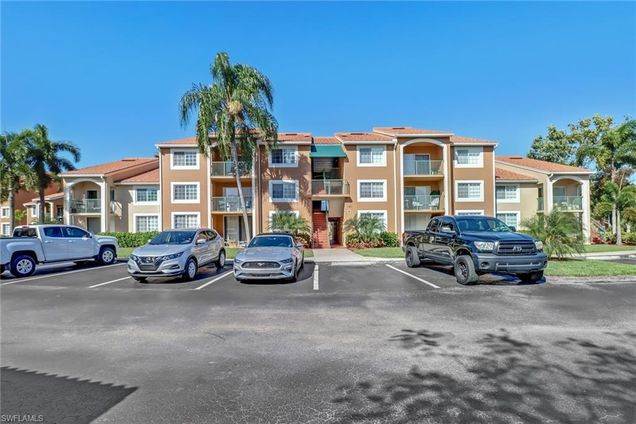 1265 Wildwood Lakes BLVD Unit 208 NAPLES, FL Condo Active - Photo 1 of 23. Opens carousel modal