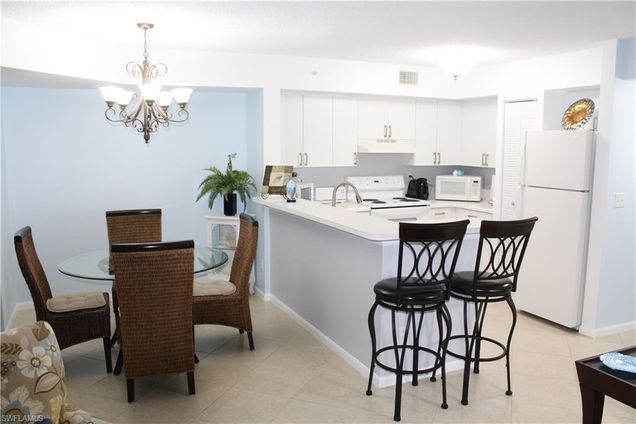 1235 Wildwood Lakes BLVD Unit 4-104 NAPLES, FL Condo Active - Photo 1 of 12. Opens carousel modal