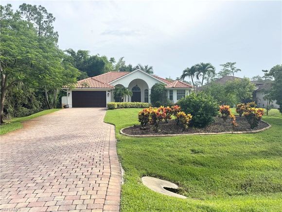 5071 Coral Wood DR NAPLES, FL House Active - Photo 1 of 24. Opens carousel modal