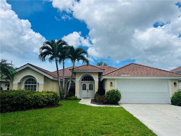 1031 Tivoli LN NAPLES, FL House Active - Photo 1 of 20. Opens carousel modal