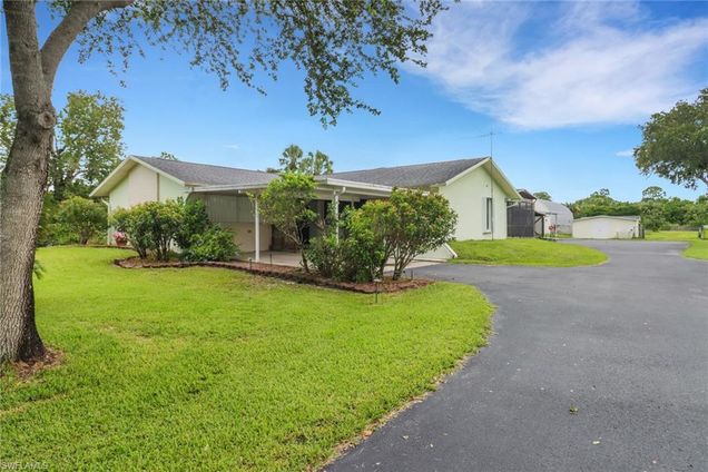 1310 11th ST SW NAPLES, FL House Active - Photo 1 of 44. Opens carousel modal