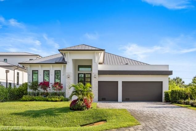 1045 Morningside DR NAPLES, FL House Active - Photo 1 of 45. Opens carousel modal