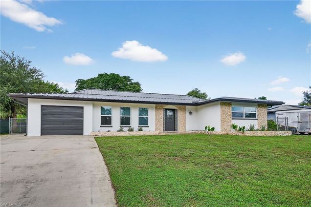 2185 41st TER SW NAPLES, FL House Active - Photo 1 of 42. Opens carousel modal