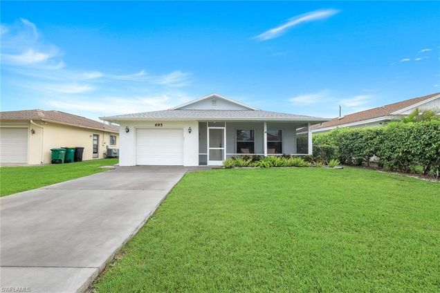 695 104th AVE N NAPLES, FL House Active - Photo 1 of 17. Opens carousel modal