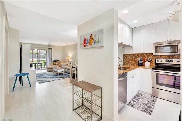 1925 Courtyard WAY Unit F101 NAPLES, FL Condo Active - Photo 1 of 20. Opens carousel modal