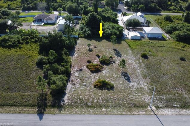 1812 Wells AVE LEHIGH ACRES, FL Plot of land Active - Photo 1 of 10. Opens carousel modal