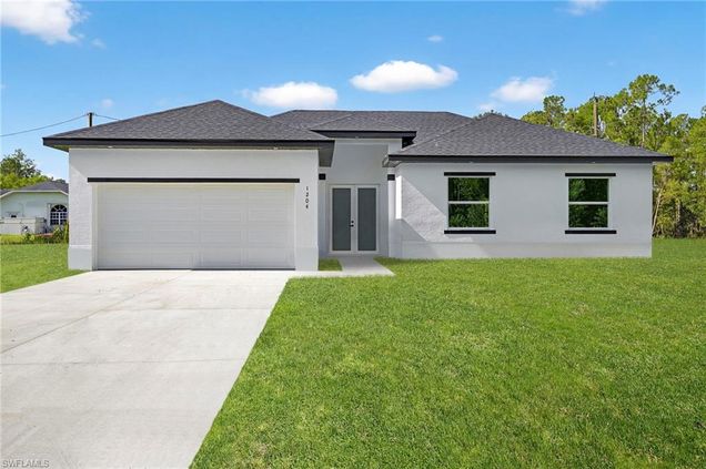 1204 11th ST LEHIGH ACRES, FL House Active - Photo 1 of 27. Opens carousel modal